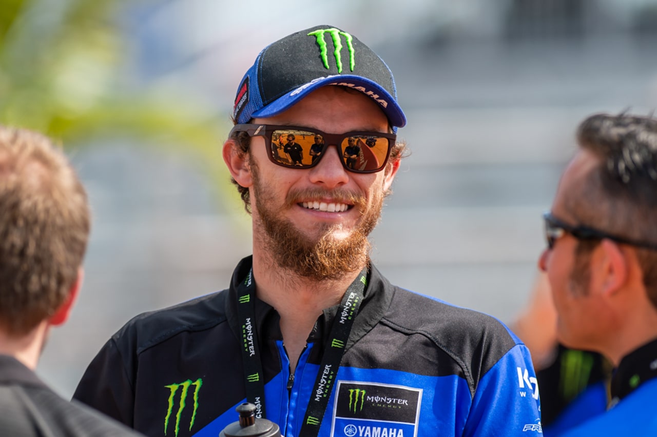 HAMPTON, GA - MARCH 18: Ty Gibbs (#54 Joe Gibbs Racing Monster Energy  Toyota) looks on during qualifications for the Ambetter Health 400 NASCAR  Cup Series race on March 18, 2023 at